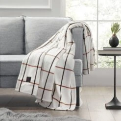 50"x60" Cozy Electric Throw Blanket - Brookstone -Home Decoration Store GUEST b6cb07f0 a171 4734 8ab6 5aaaad74d34c